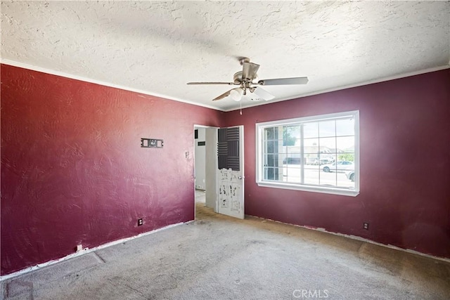 1811 Elaine St, Pomona, CA 91767 - carpeted spare room with a textured ceiling, ceiling fan, and ornamental molding