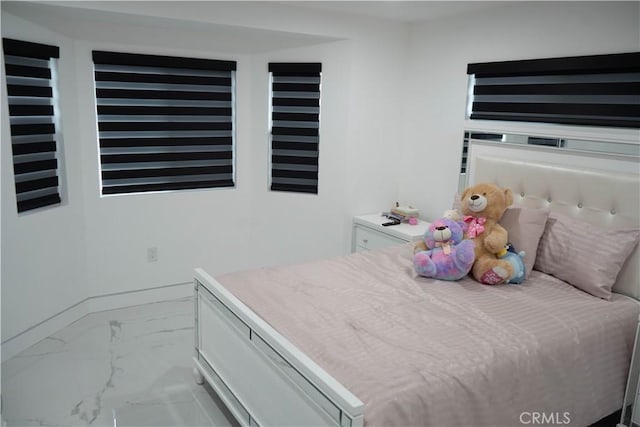 9359 Cecilia St, Downey, CA 90241 - bedroom featuring marble look tile flooring