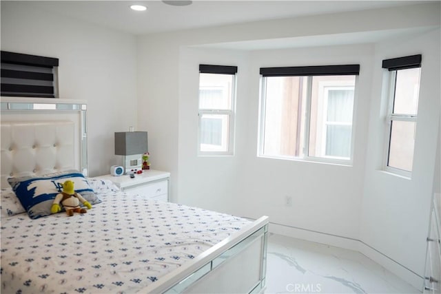 9359 Cecilia St, Downey, CA 90241 - bedroom with light marble finish floors and recessed lighting