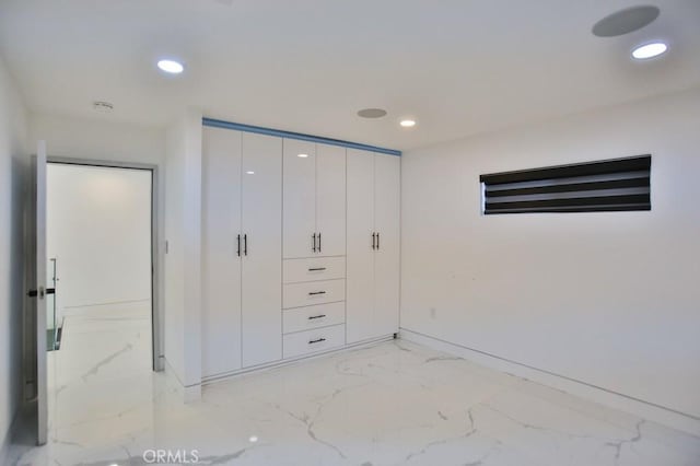 9359 Cecilia St, Downey, CA 90241 - unfurnished bedroom with light marble finish flooring and recessed lighting