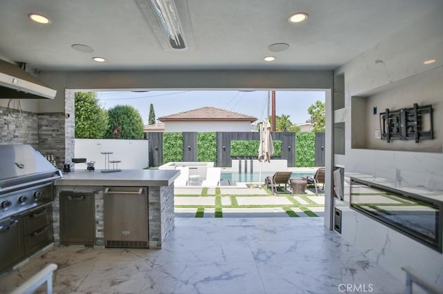 9359 Cecilia St, Downey, CA 90241 - fenced backyard with exterior kitchen and a patio