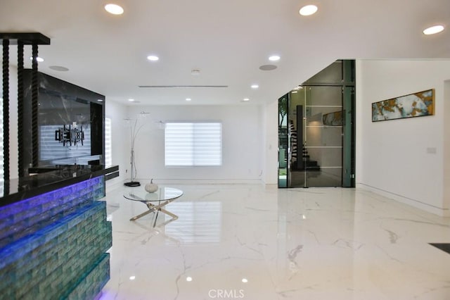 9359 Cecilia St, Downey, CA 90241 - unfurnished living room featuring marble tiled floors and recessed lighting