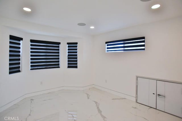 9359 Cecilia St, Downey, CA 90241 - spare room featuring marble finish floors and recessed lighting