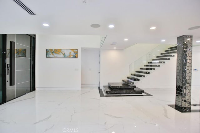 9359 Cecilia St, Downey, CA 90241 - basement featuring recessed lighting, stairway, and marble tiled flooring