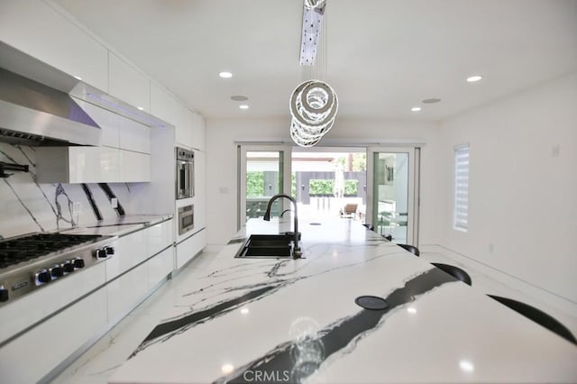 9359 Cecilia St, Downey, CA 90241 - kitchen with modern cabinets, appliances with stainless steel finishes, white cabinets, french doors, and recessed lighting