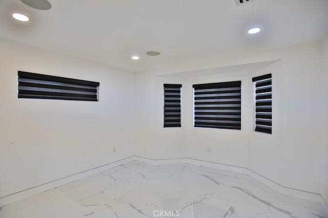 9359 Cecilia St, Downey, CA 90241 - spare room featuring marble finish floors and recessed lighting