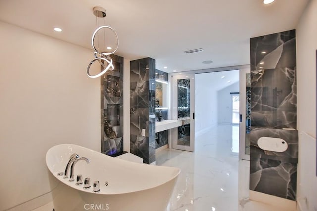 9359 Cecilia St, Downey, CA 90241 - full bath featuring a freestanding bath, recessed lighting, marble tiled floors, and walk in shower