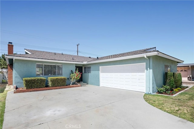 1941 W 235th Pl, Torrance, CA 90501 - ranch-style home featuring stucco siding, an attached garage, and concrete driveway