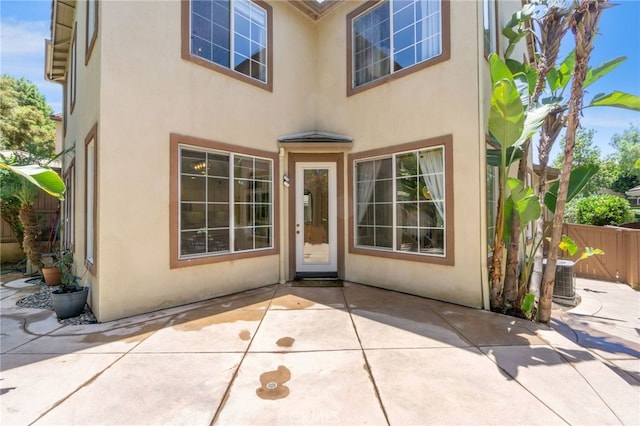 3 Kyle Ct, Ladera Ranch, CA 92694 - doorway to property featuring stucco siding and a patio area