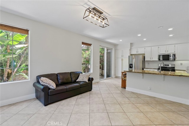 3 Kyle Ct, Ladera Ranch, CA 92694 - living area with light tile patterned floors and recessed lighting