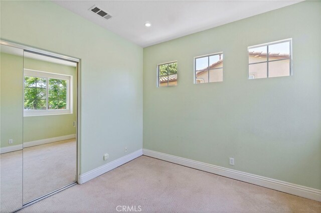 3 Kyle Ct, Ladera Ranch, CA 92694 - unfurnished room featuring healthy amount of natural light, carpet floors, and recessed lighting