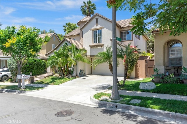 3 Kyle Ct, Ladera Ranch, CA 92694 - mediterranean / spanish house featuring stucco siding, concrete driveway, an attached garage, and a tile roof