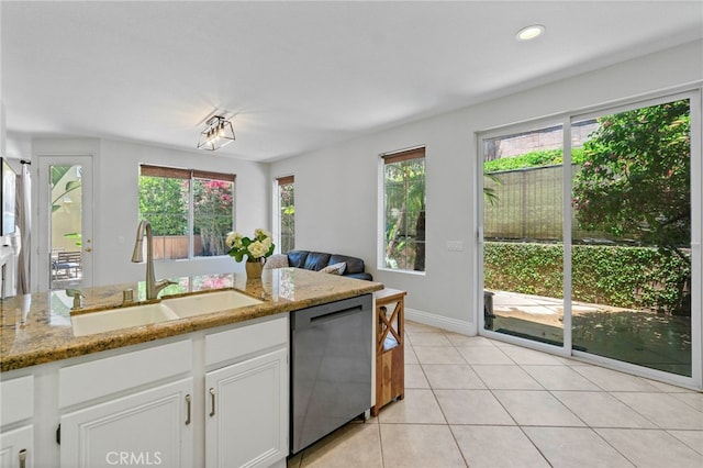 3 Kyle Ct, Ladera Ranch, CA 92694 - kitchen featuring stainless steel dishwasher, plenty of natural light, white cabinets, light tile patterned flooring, and recessed lighting