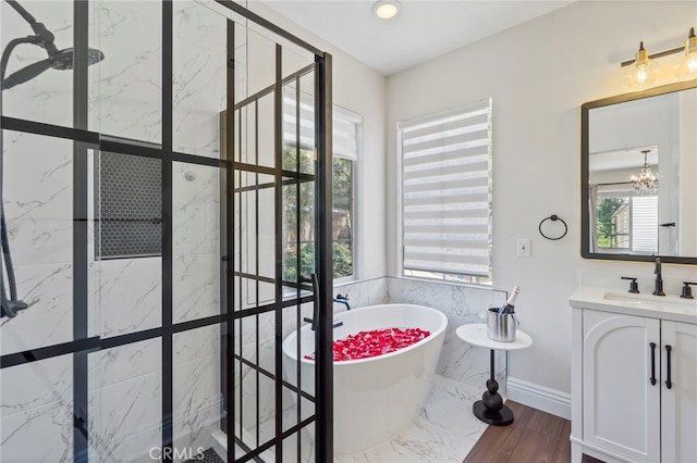 3 Kyle Ct, Ladera Ranch, CA 92694 - full bathroom with a soaking tub, vanity, a marble finish shower, a chandelier, and recessed lighting
