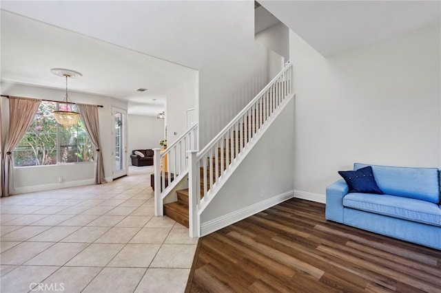 3 Kyle Ct, Ladera Ranch, CA 92694 - stairs with baseboards and wood finished floors