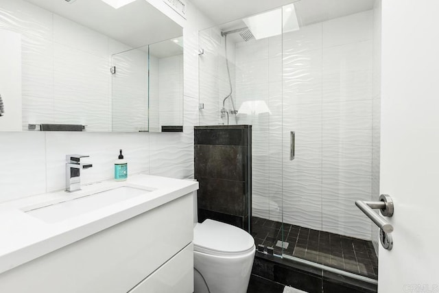 6544 Caminito Northland Ln, Jolla, CA 92037 - bathroom with tile walls, vanity, and a shower stall