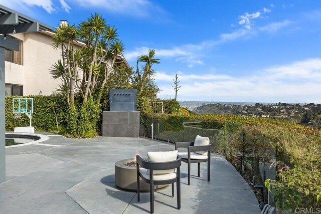 6544 Caminito Northland Ln, Jolla, CA 92037 - view of patio / terrace featuring an outdoor fire pit