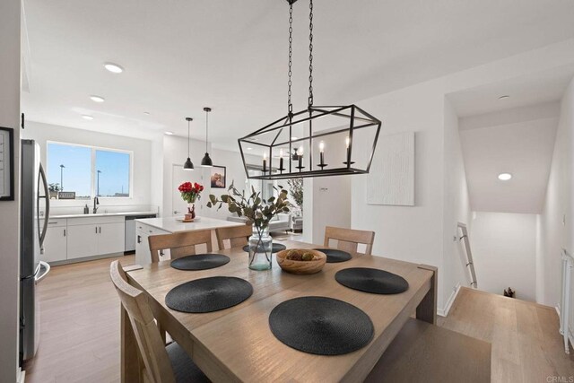 5252 Beachfront Cove St Unit 197, San Diego, CA 92154 - dining space featuring light wood-style floors and recessed lighting