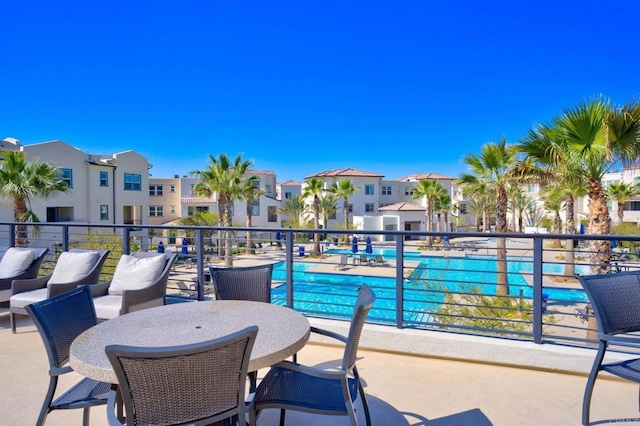 5252 Beachfront Cove St Unit 197, San Diego, CA 92154 - balcony with view of pool area and a residential view