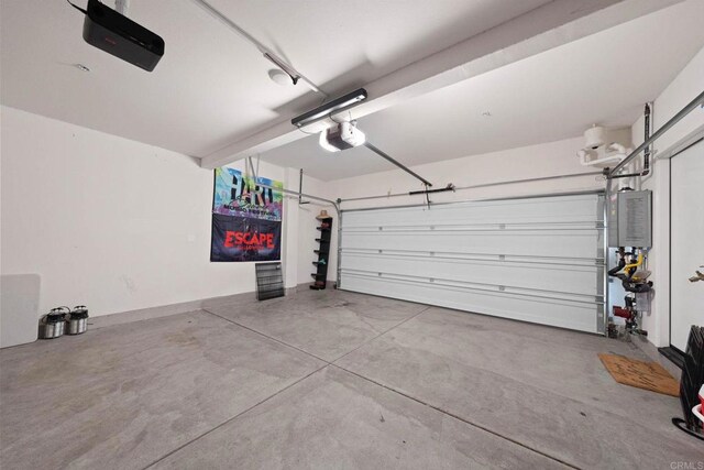5252 Beachfront Cove St Unit 197, San Diego, CA 92154 - garage featuring a garage door opener