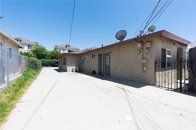 3312 Evelyn Ave, Rosemead, CA 91770 - back of house featuring stucco siding and a patio area