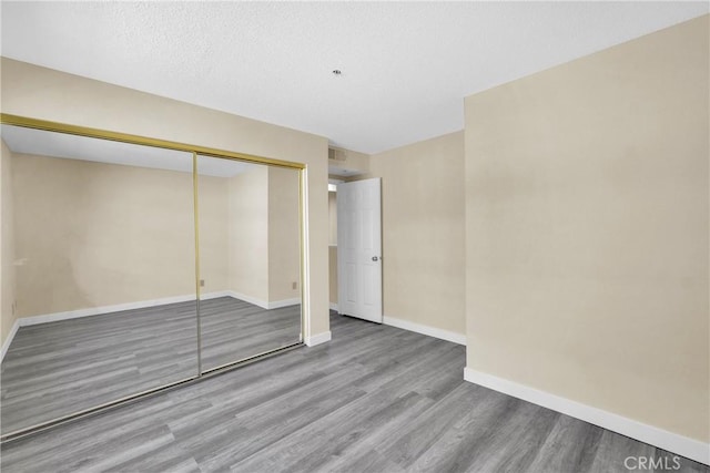519 Sefton Ave Unit D, Monterey Park, CA 91755 - unfurnished bedroom featuring wood finished floors and a closet