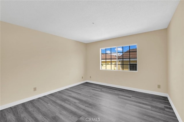 519 Sefton Ave Unit D, Monterey Park, CA 91755 - spare room with dark wood finished floors and a textured ceiling
