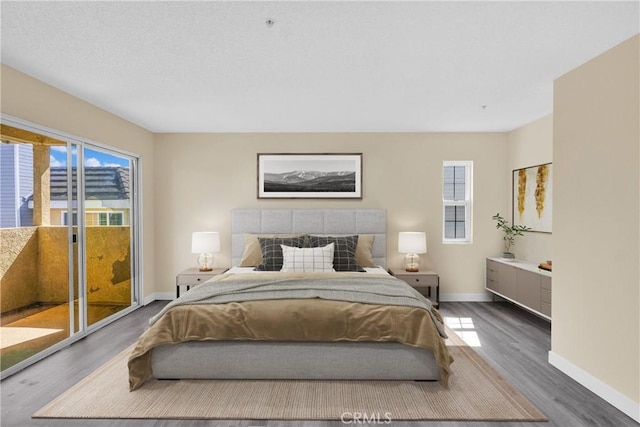 519 Sefton Ave Unit D, Monterey Park, CA 91755 - bedroom with access to outside, multiple windows, and wood finished floors