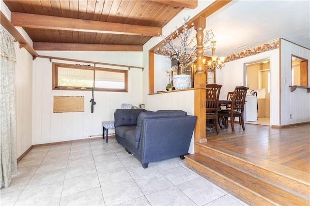 6644 Bothwell Rd, Reseda, CA 91335 - living area with light tile patterned floors, wood ceiling, a chandelier, and wooden walls