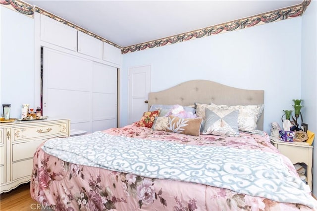 6644 Bothwell Rd, Reseda, CA 91335 - bedroom with light wood-style floors and a closet