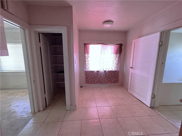 29095 Arrowhead Ave, Barstow, CA 92311 - corridor with light tile patterned flooring