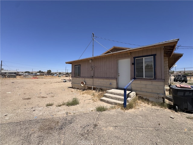 29095 Arrowhead Ave, Barstow, CA 92311 - view of front of property featuring entry steps and board and batten siding