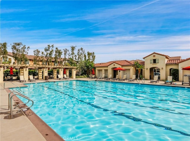 205 W Sparkleberry Ave, Orange, CA 92865 - community pool featuring a patio area