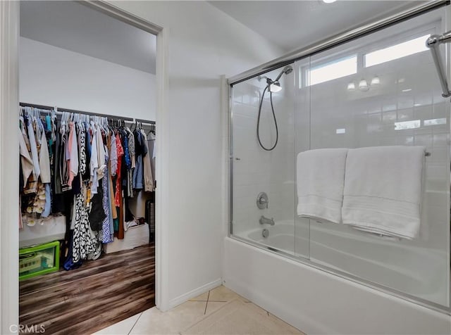 205 W Sparkleberry Ave, Orange, CA 92865 - bathroom with combined bath / shower with glass door, tile patterned floors, and a spacious closet