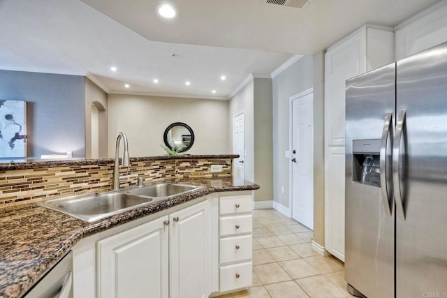 9263 Regents Rd Unit B106, La Jolla, CA 92037 - kitchen featuring stainless steel refrigerator with ice dispenser, dishwasher, white cabinetry, ornamental molding, and tasteful backsplash