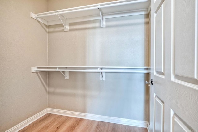 9263 Regents Rd Unit B106, La Jolla, CA 92037 - spacious closet with wood finished floors