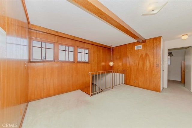 2033 W 169th Pl, Torrance, CA 90504 - carpeted empty room with beam ceiling and wooden walls