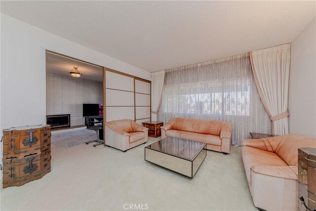 2033 W 169th Pl, Torrance, CA 90504 - living area featuring carpet floors and a fireplace