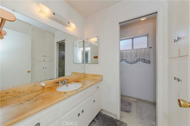 2033 W 169th Pl, Torrance, CA 90504 - bathroom featuring vanity and speckled floor
