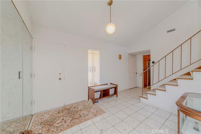 2033 W 169th Pl, Torrance, CA 90504 - entrance foyer with vaulted ceiling, stairway, and light tile patterned flooring