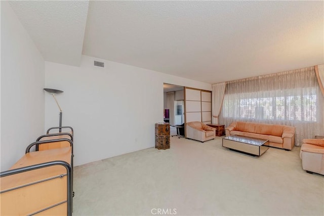 2033 W 169th Pl, Torrance, CA 90504 - carpeted living room with a textured ceiling