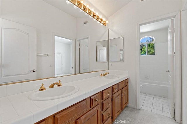 31794 Corte Rosario, Temecula, CA 92592 - bathroom featuring double vanity and tile patterned floors