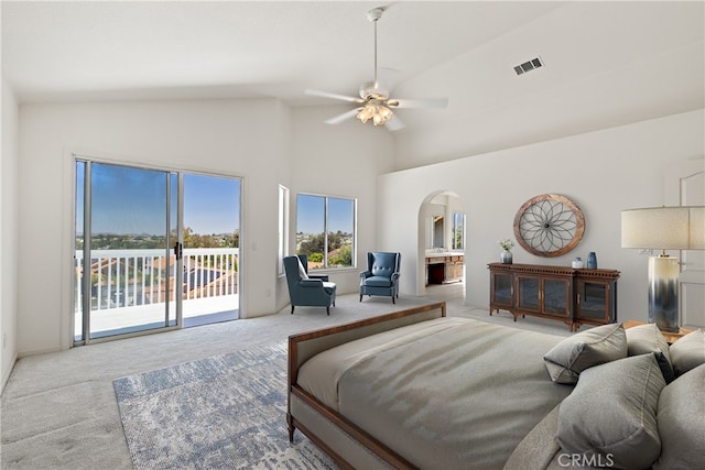 31794 Corte Rosario, Temecula, CA 92592 - carpeted bedroom featuring arched walkways, access to exterior, ensuite bath, a ceiling fan, and high vaulted ceiling