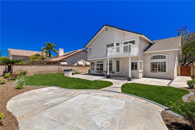 31794 Corte Rosario, Temecula, CA 92592 - back of house with a balcony, a patio, a fenced backyard, and stucco siding