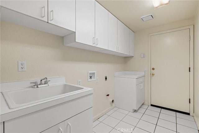 31794 Corte Rosario, Temecula, CA 92592 - laundry room featuring hookup for an electric dryer, hookup for a washing machine, cabinet space, light tile patterned floors, and gas dryer hookup