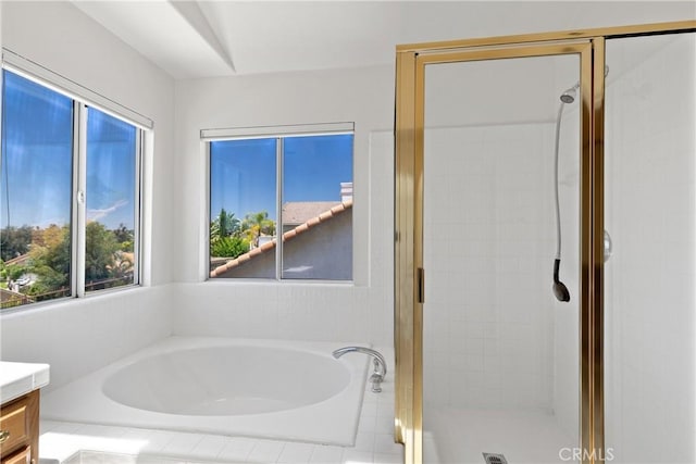 31794 Corte Rosario, Temecula, CA 92592 - bathroom featuring vanity, a shower stall, and a garden tub