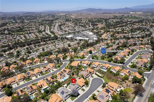 31794 Corte Rosario, Temecula, CA 92592 - aerial view of property and surrounding area featuring mountains and nearby suburban area