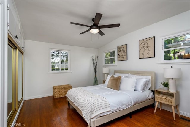 8150 Ocean View Ave, Whittier, CA 90602 - bedroom featuring vaulted ceiling, wood finished floors, a closet, and a ceiling fan