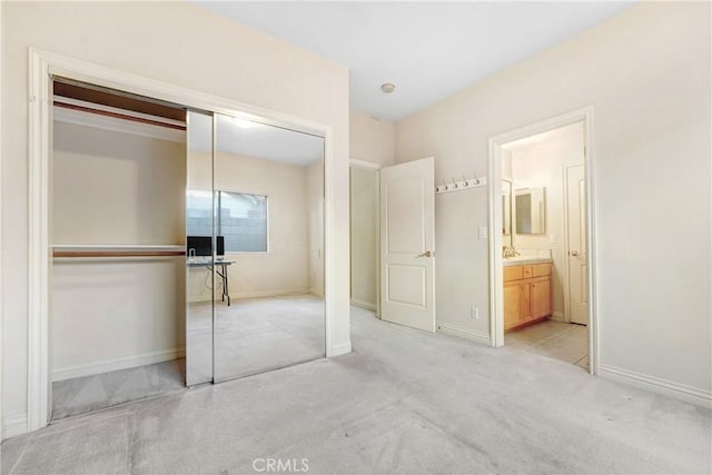 9103 Rancho Real Rd, Temple City, CA 91780 - unfurnished bedroom with light carpet, a closet, and ensuite bath