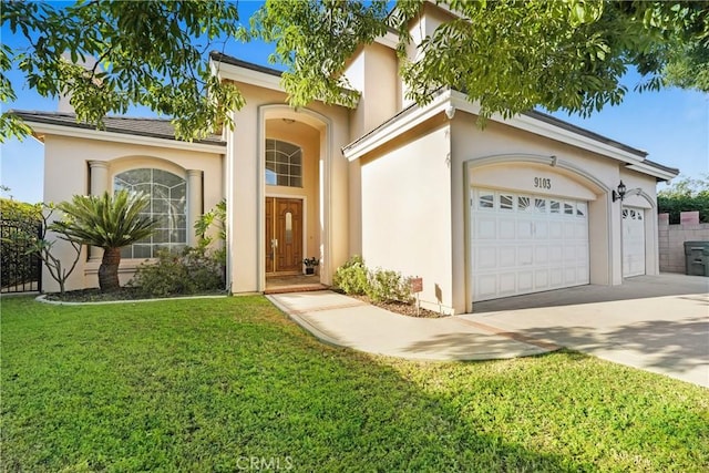 9103 Rancho Real Rd, Temple City, CA 91780 - mediterranean / spanish-style house featuring stucco siding, an attached garage, a front yard, and driveway
